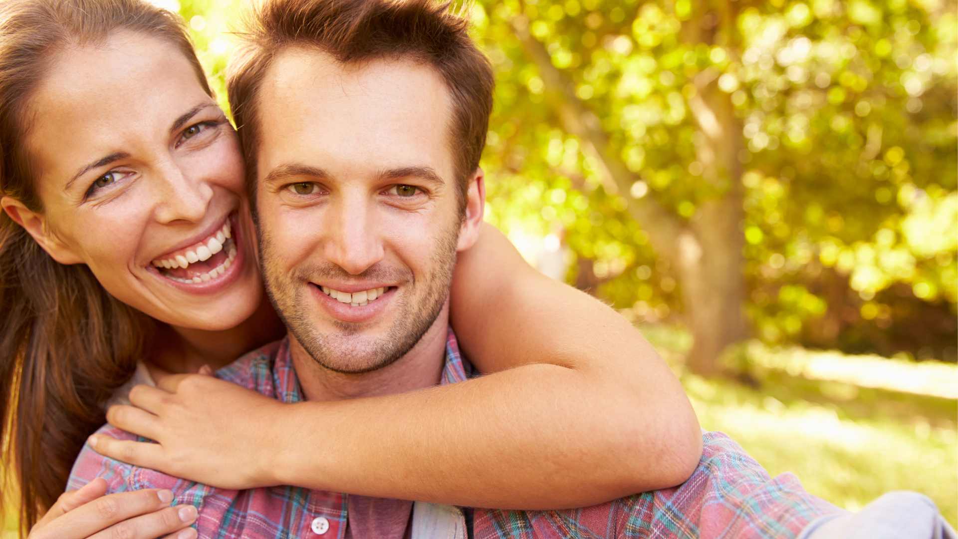 Happy white couple; symbolizing how to fix your relationship with a couples therapy intensive or couples therapy retreat.